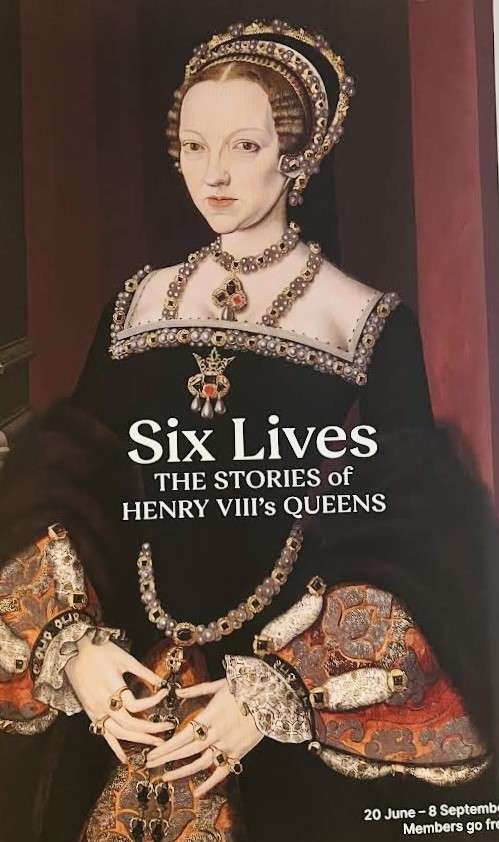 Poster of a regal woman and the words Six Lives the stories of Henry VIII's queens in National Portrait Gallery in London